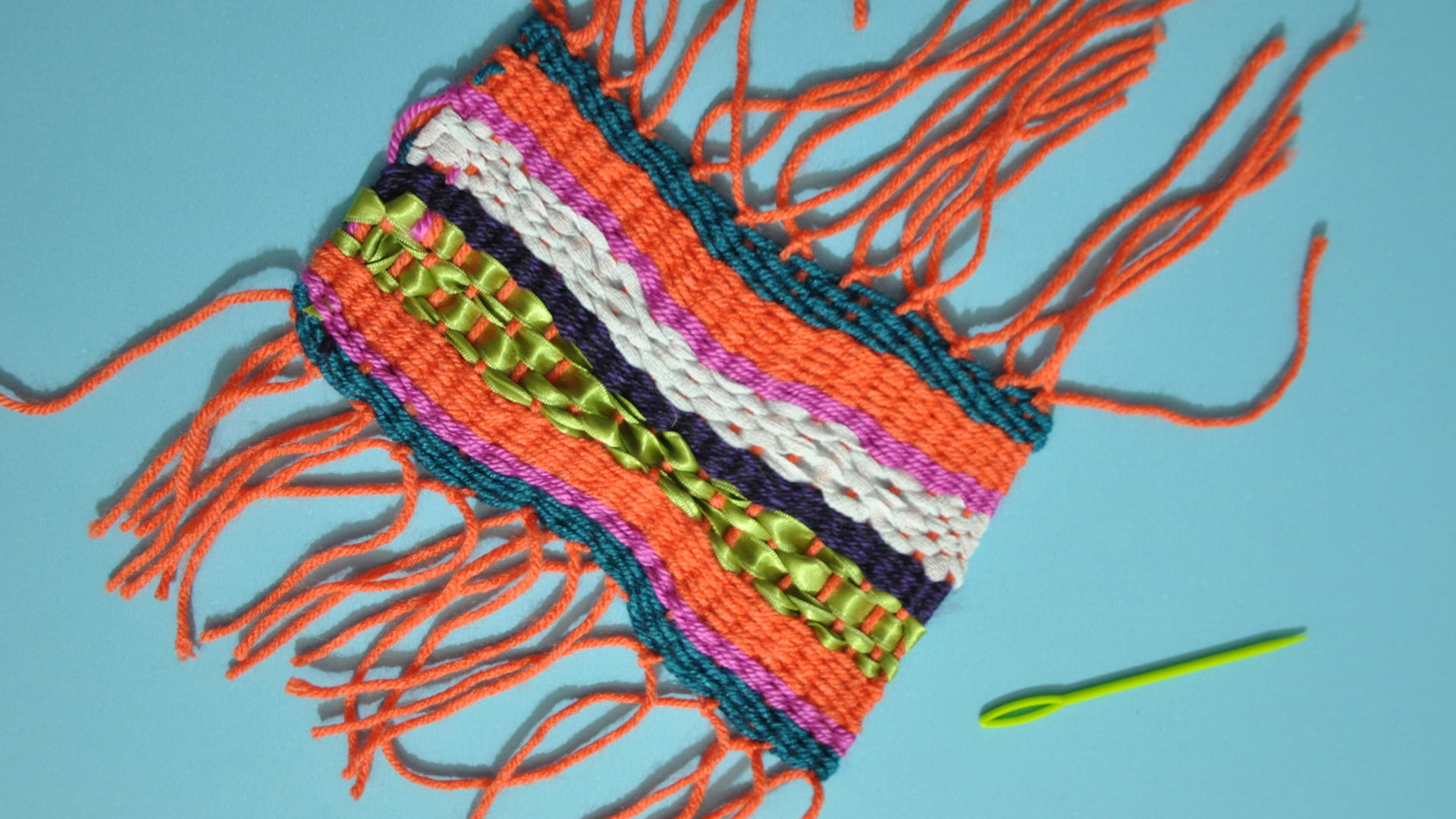 Weaving with Colorful Fabric slide 3